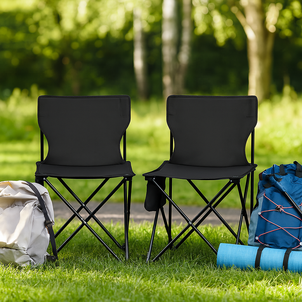 Two portable camping chairs with backpack and mat set up in forest park – ideal for hiking and camping trips